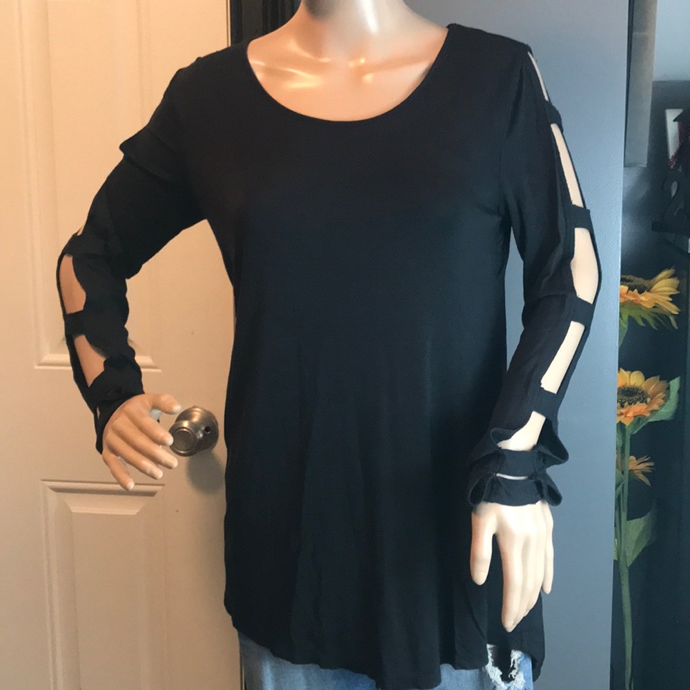 Maurice’s size small. Black flowy, long sleeve.